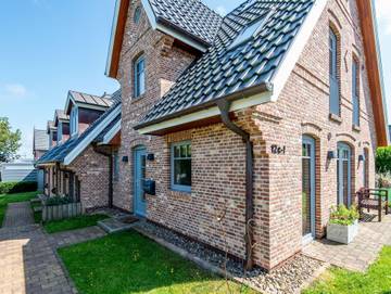 Ferienhaus für 3 Personen, mit Terrasse und Garten in Westerland