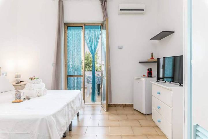 Entire apartment, 15 \"Il Porticciolo Vacanze\" Studio Apartment with a Veranda Overlooking the Garden 15 in Villanova (Apulia), Ostuni