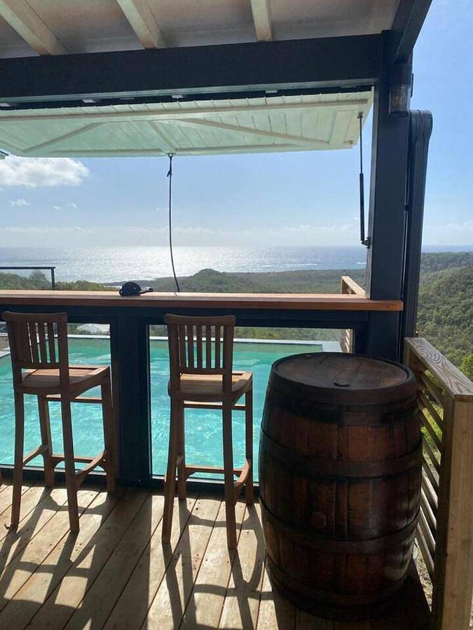 Location de vacances pour 6 personnes, avec vue et jardin ainsi que piscine et terrasse dans Plage du Grand Macabou