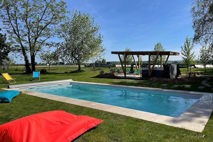 Maison de vacances pour 4 personnes, avec jardin et piscine ainsi que balcon et jacuzzi