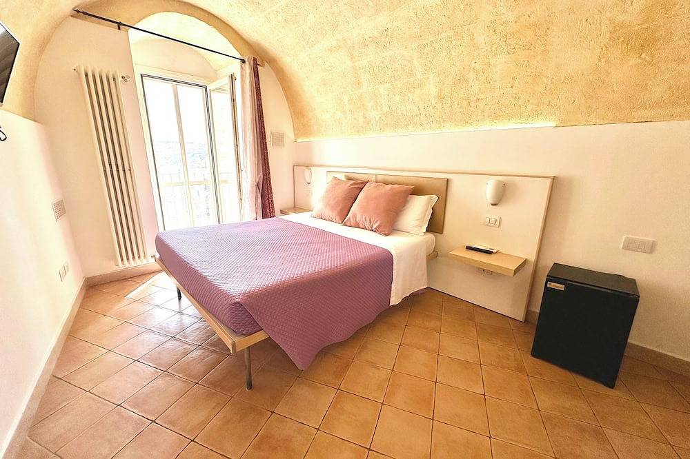 Il Sorriso dei Sassi Rooms. Idris Superior Deluxe on Sassi view. in Sassi di Matera, Matera