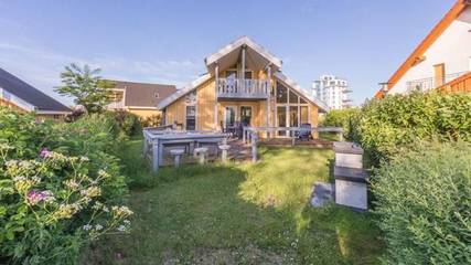 Ferienhaus für 6 Personen, mit Whirlpool und Balkon sowie Garten und Sauna in Röbel-Müritz