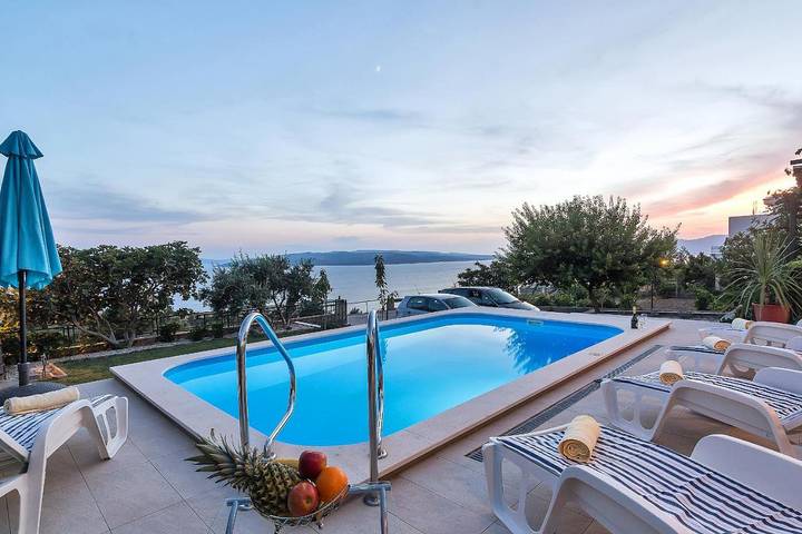 Ferienhaus für 7 Personen, mit Balkon und Terrasse sowie Garten und Pool