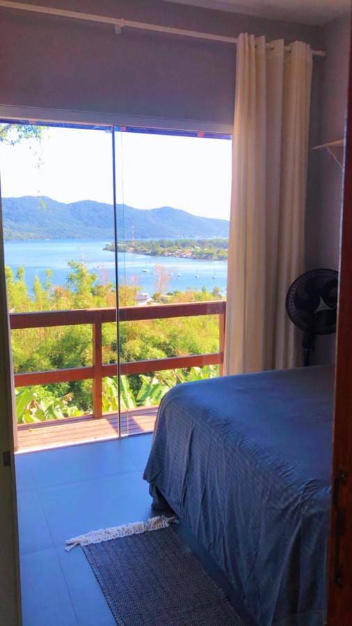 Casas e apartamentos de temporada para 3 pessoas, com vista e vista para o lago e ainda balcão em Praia Mole