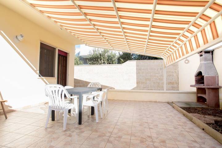 Villa per 9 persone, con Balcone e Giardino a Torre Lapillo