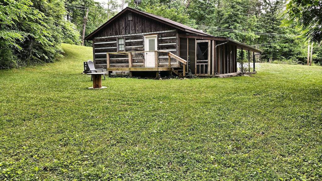 Moonshine Cabin with a nice yard on the creek in the shadows of the Smokies in Cocke County