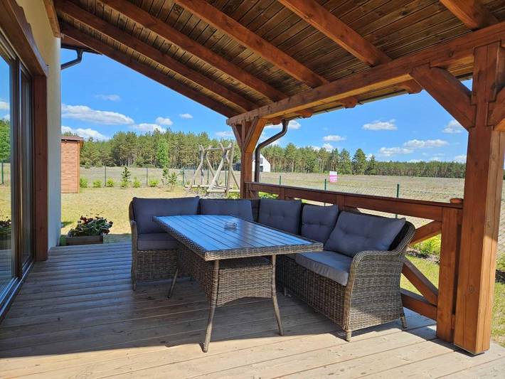 Cómoda casa de vacaciones con terraza y jardín. in Bosque de Tuchola