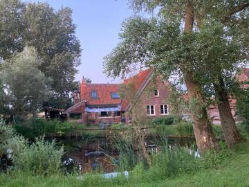 Location de vacances pour 12 personnes, avec vue à Herzeele