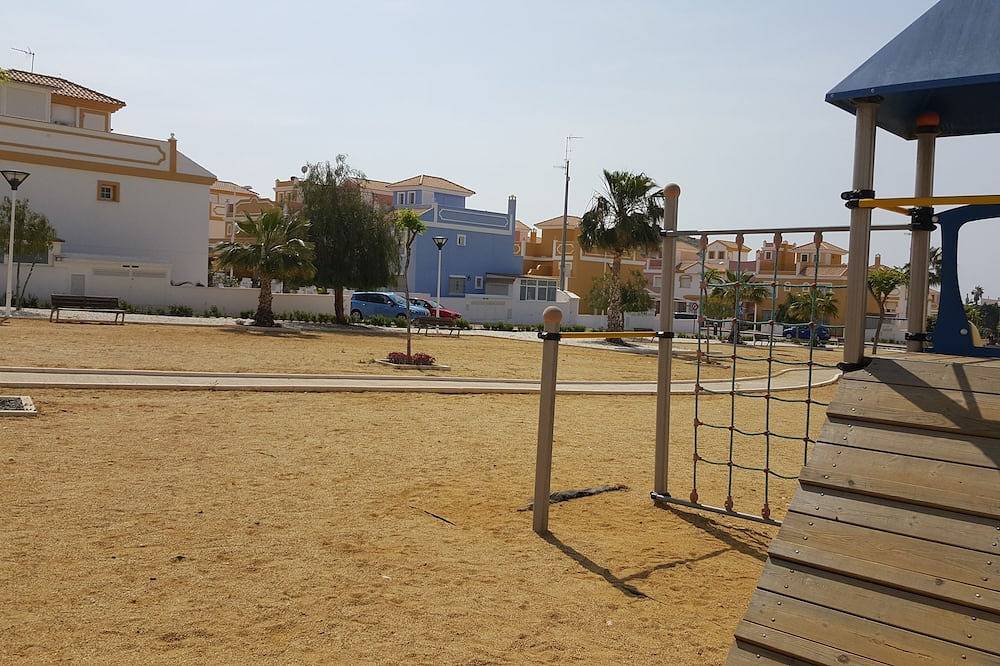 Roze huis met zwembad en wifi in San Juan de los Terreros, Pulpí