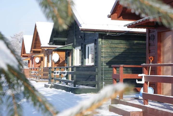 Chalet für 8 Personen, mit Ausblick und Garten sowie Seeblick und Kinderpool, mit Haustier in Niederschlesien