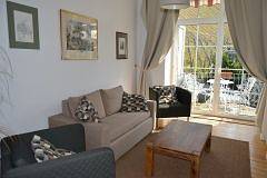 Ferienwohnung für 4 Personen, mit Balkon und Garten sowie Ausblick
