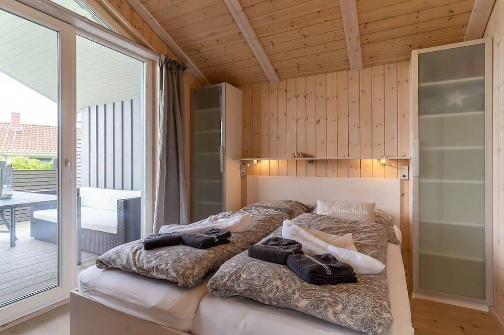 Ferienhaus mit Strandkorb, Kaminofen, Whirlpool und Sauna in Wesselburenerkoog, Dithmarschen