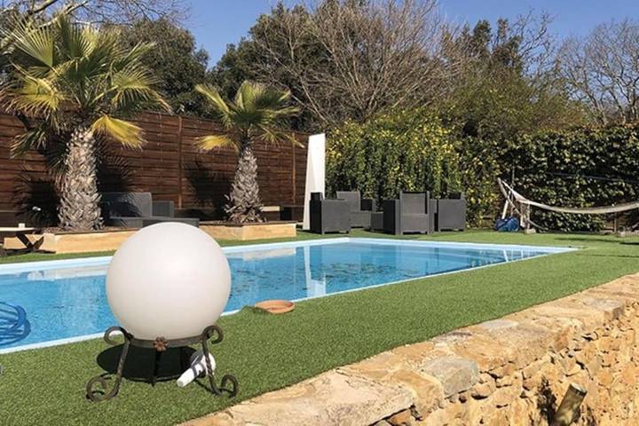 Appartement de vacances pour 2 personnes, avec Terrasse ainsi que Jardin et Piscine