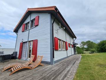 Ferienhaus für 8 Personen, mit Garten und Seeblick sowie Ausblick, kinderfreundlich in Neubukow-Salzhaff