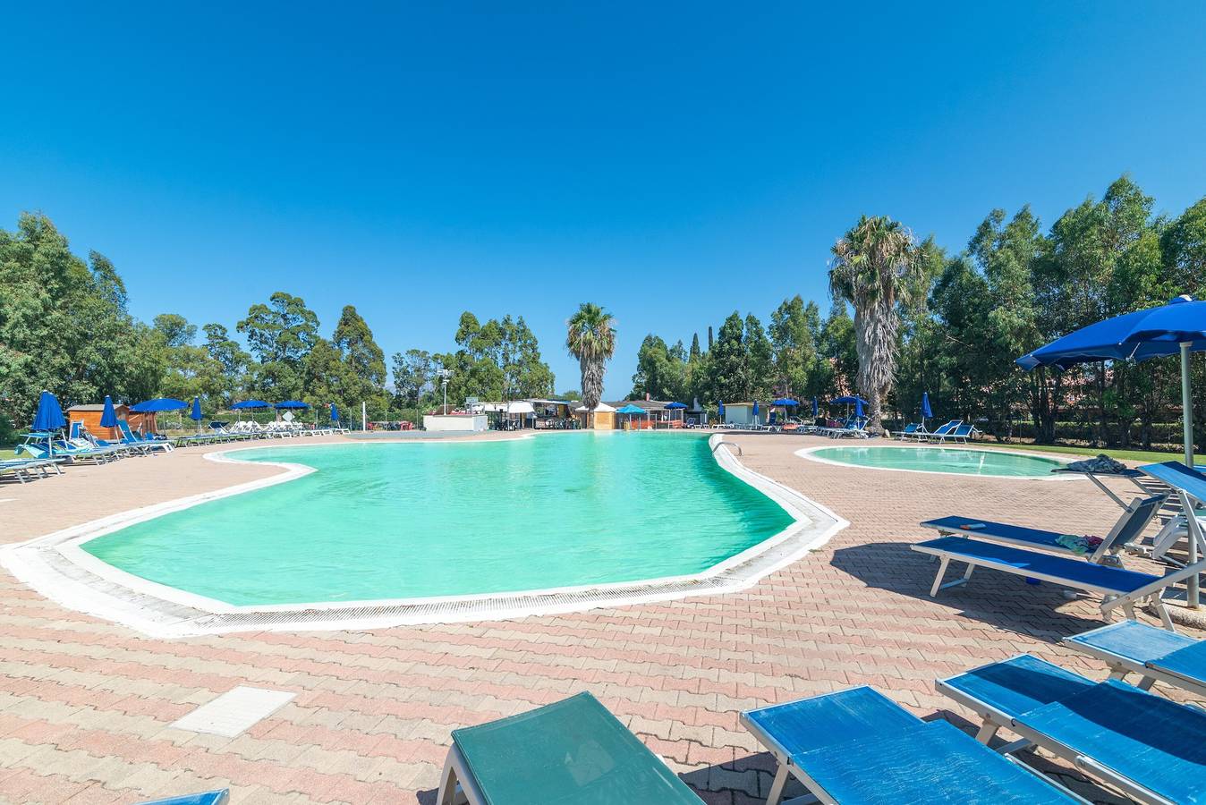 Holiday Home 'Casa Vacanze Olbia' with Shared Pool, Balcony and Air Conditioning in Le Vecchie Saline, Gallura