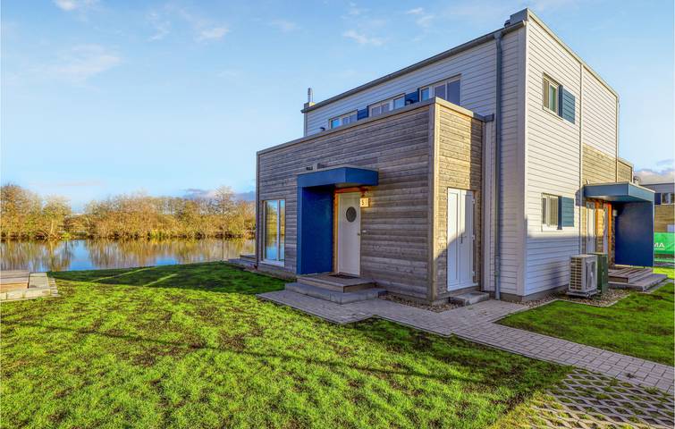 Ferienhaus für 4 Personen, mit Terrasse und Garten sowie Seeblick in Wesermarsch