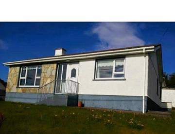 Gîte pour 6 personnes, avec terrasse ainsi que jardin et vue dans Dunglow
