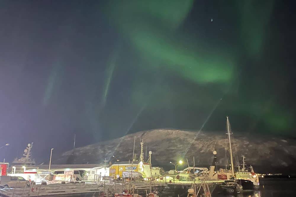 Norwegian winter adventure, northern lights, skiing, views, sea and mountains. in Kvaløya, Tromsø