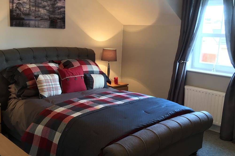 Luxus Portrush Ferienhäuser - The Green. Schlafmöglichkeiten für 11 in 8 Betten. Hunde. Wifi Golf in Portrush, Grafschaft Londonderry