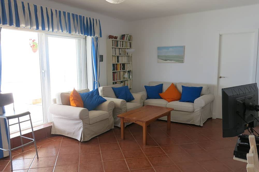An air-conditioned villa, set in a large garden, on the first line of the beach in Los Caños de Meca, Barbate