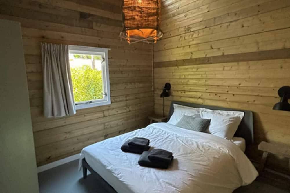 Sfeervol ingericht houten huis met hottub in bos in Soesterberg, Provincie Utrecht