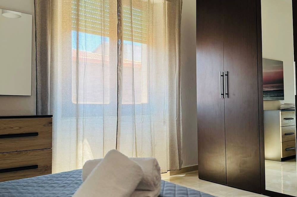 Appartamento intero, Casa Maria , Accogliente e perfetto per che desidera passeggiare  in centrocittà in Iglesias Centro, Iglesias