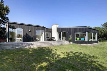 Ferienhaus für 8 Personen, mit Whirlpool und Terrasse sowie Garten und Sauna, mit Haustier in Kærgården