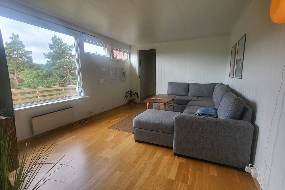 Ganze Wohnung, Spacious Scandinavian-style apartment right by the forest with beautiful views in Kristiansand