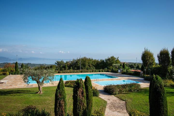 Appartamento per 4 persone, con giardino e piscina, con animali domestici in Puegnago del Garda