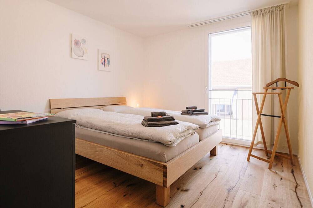 Ganze Wohnung, Apartment Eiger with lake and mountain view in Spiez, Thunersee