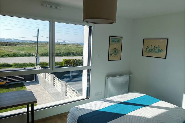 Recent house facing the dunes and Grève Blanche beach, at the foot of the Gr34. in Plouguerneau, Brest region