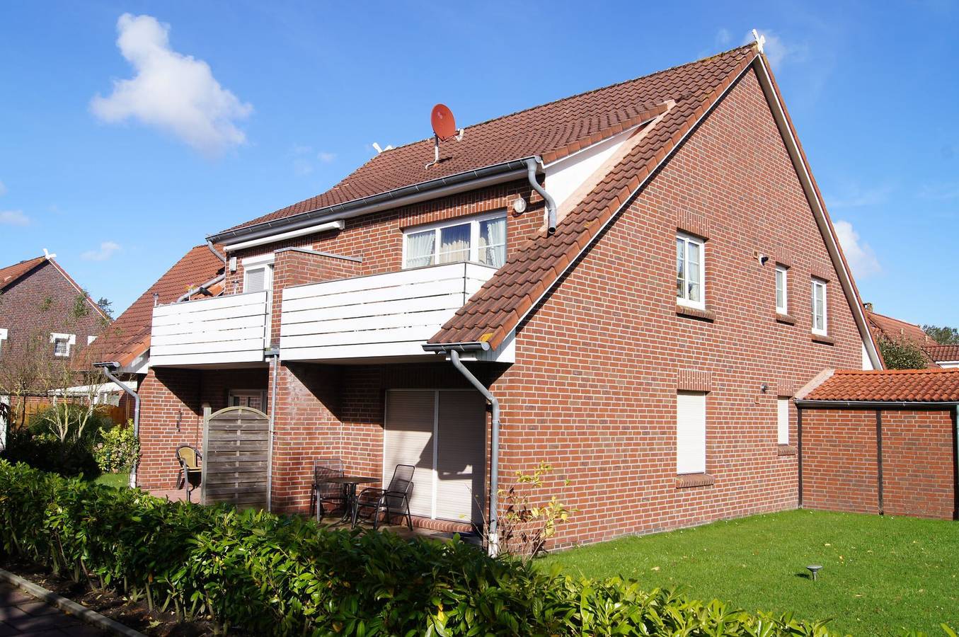 Appartement entier, Appartement 'Fewo Wittesand' avec terrasse commune, jardin commun et Wi-Fi in Hooksiel, Côte sud de la mer du Nord