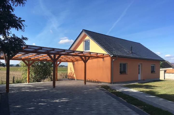 Ferienhaus für 6 Personen, mit Balkon und Garten