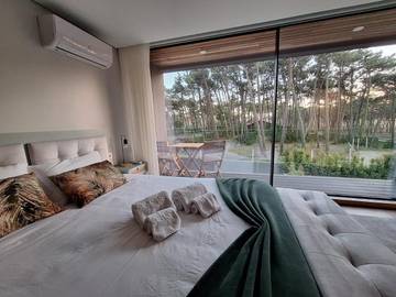 Location de vacances pour 4 personnes, avec piscine ainsi que vue et jardin dans Fão