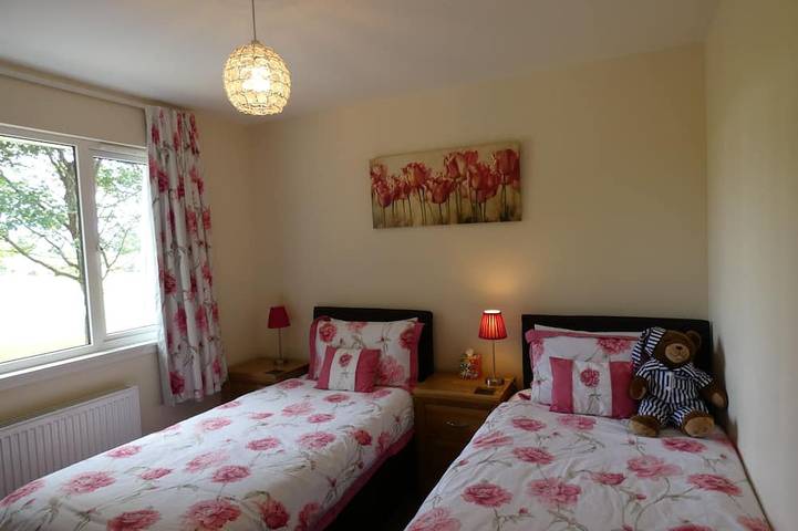 Lochside with beach access uninterrupted views of spectacular Highland Mountains in Highlands