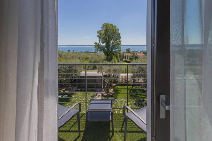 B&b per 2 persone, con Balcone e Terrazza nonché Idromassaggio e Giardino a Moniga del Garda