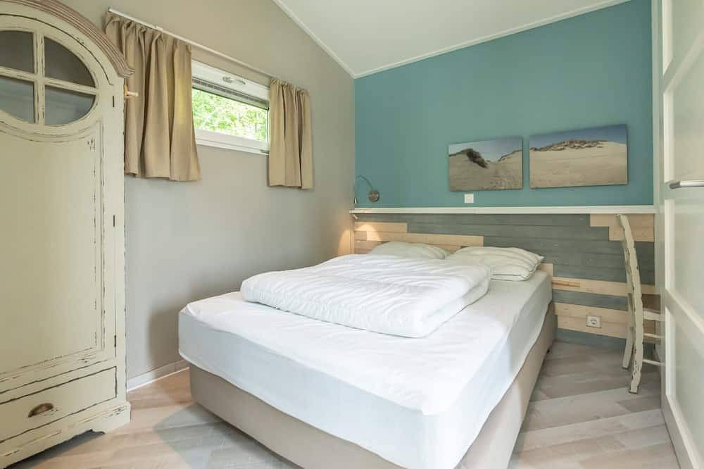 Chalet 'Der blaue Vogel' ist der ideale Ort für entspannte Ferien mit der Familie. in Burgh-Haamstede, Zeeuwse Kust