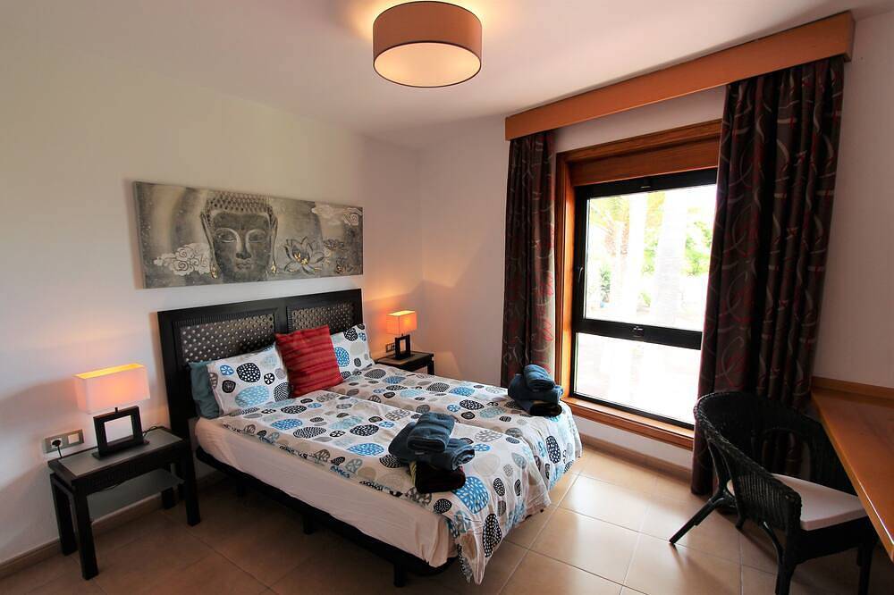 Villa with pool for exclusive group holiday under palm trees in Chayofa, Arona