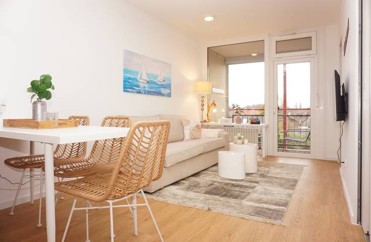 Appartement de vacances pour 3 personnes, avec jardin et sauna ainsi que vue sur le lac et balcon - 1
