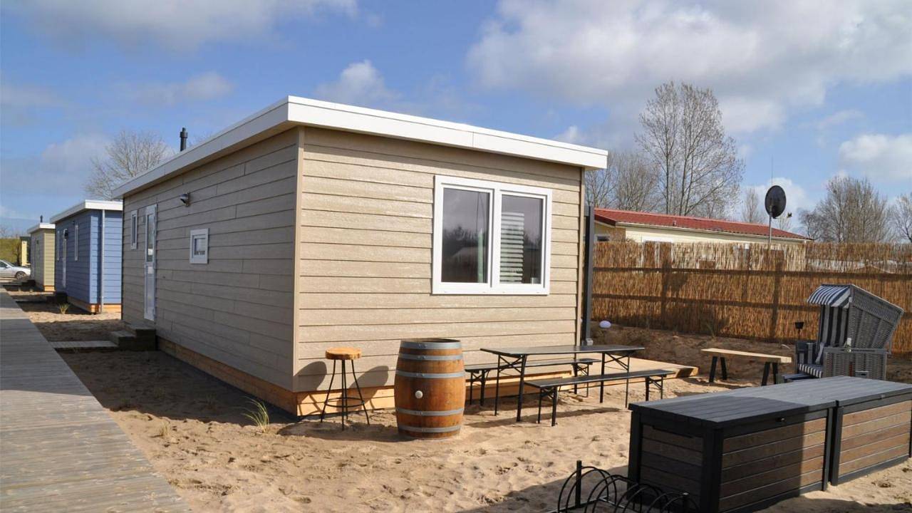 Ferienhaus Strandhus - Ankerplatz Dahme, Urlaub in Dünen, Terrasse, Strandkorb in Dahme, Ostholstein