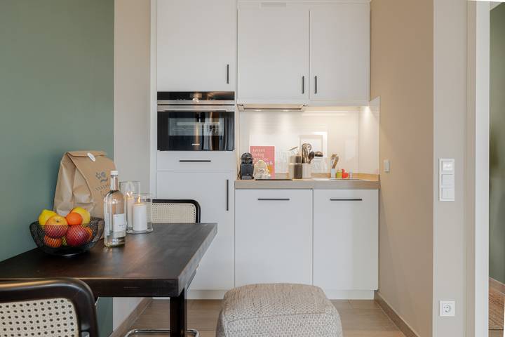 Ferienwohnung für 2 Personen, mit Balkon und Terrasse sowie Garten und Seeblick in Wenningstedt
