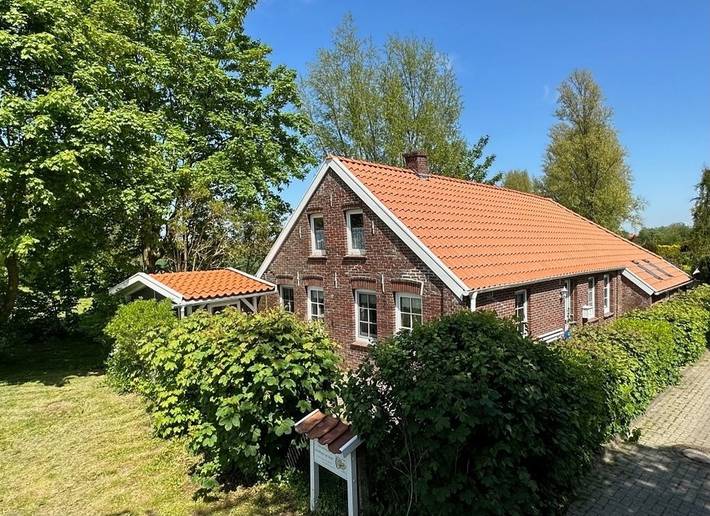 Ferienhaus für 4 Personen, mit Terrasse und Garten sowie Sauna in Altfunnixsiel