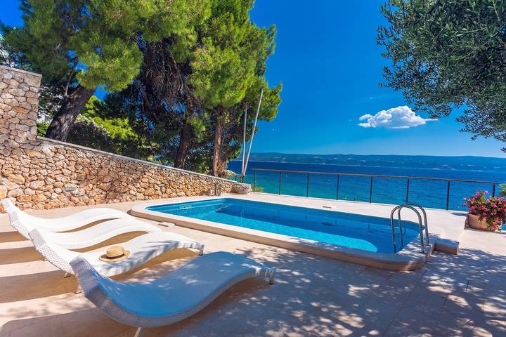 Ferienhaus für 4 Personen, mit Balkon/Terrasse und Garten sowie Pool