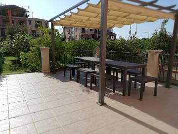 Cottage pour 4 personnes, avec terrasse et jardin à Tortolì