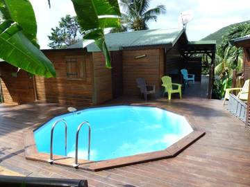 Maison de campagne pour 2 personnes, avec piscine ainsi que vue et jardin, adapté aux familles à Deshaies