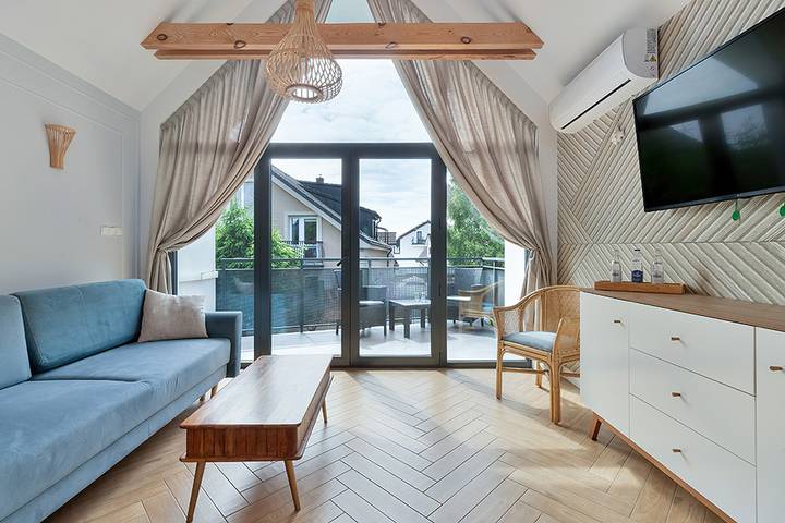 Ferienwohnung für 4 Personen, mit Balkon und Whirlpool sowie Garten und Sauna in Leba