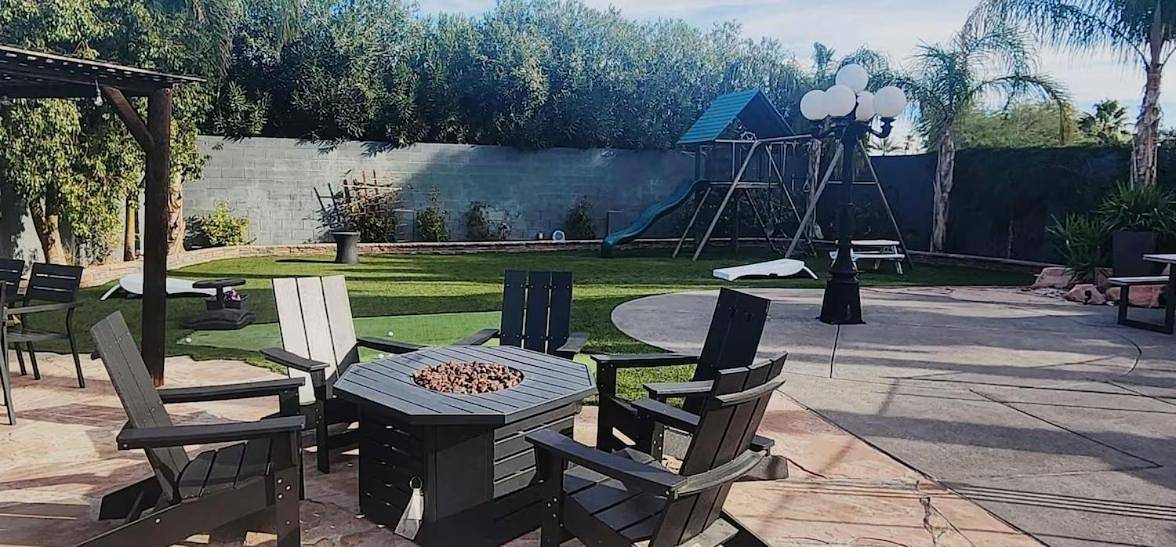 Luxury Villa, with bonus pool house, Private Pool, Hot tub, rock water fall and slide, putting green, basketball, shuffle board, play gym, privately gated on circular driveway. in Las Vegas, Red Rock Canyon