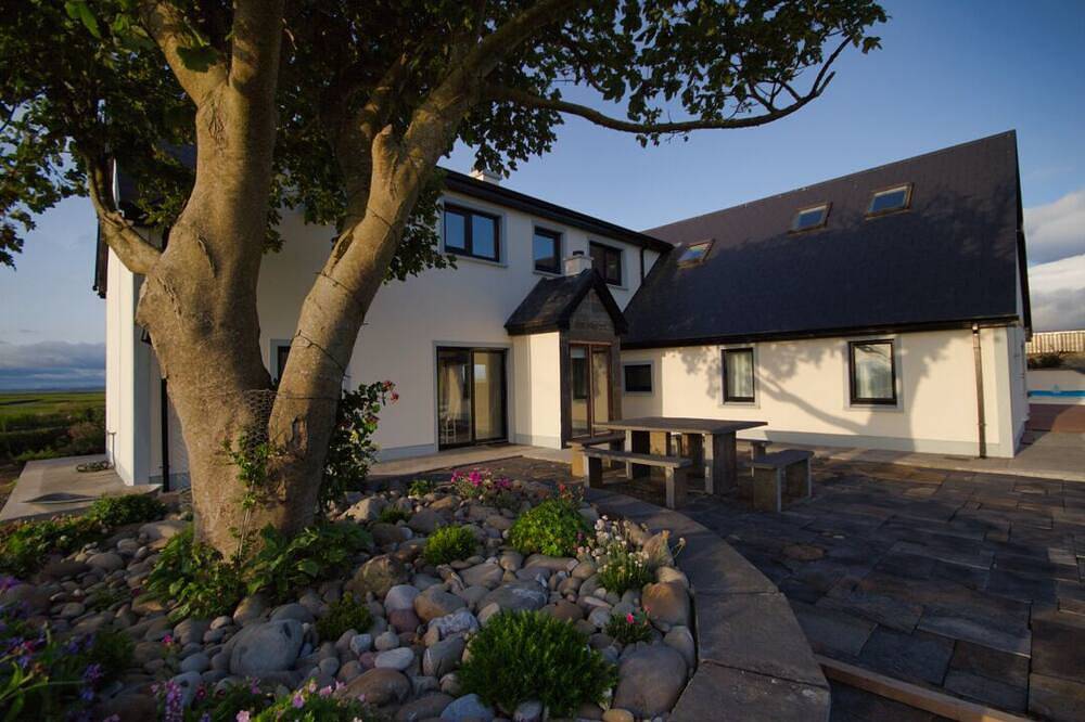 The boathouse: modern house by the sea in County Clare