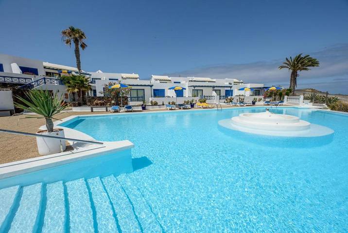 Gîte pour 2 personnes, avec piscine et sauna ainsi que vue et jardin dans Charco del Palo