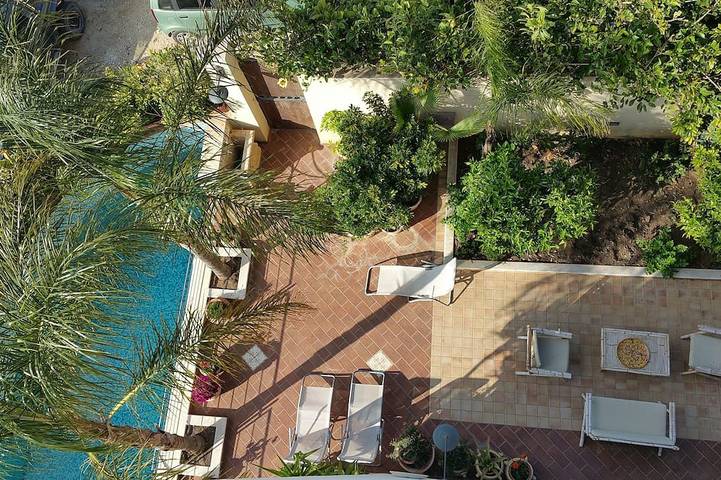 Ferienhaus für 4 Personen, mit Terrasse und Garten sowie Pool